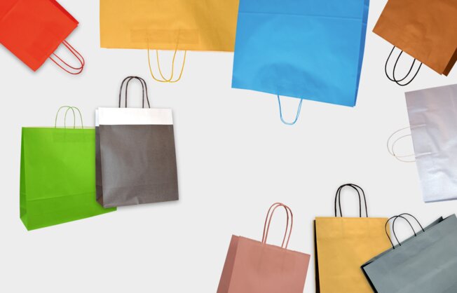 Darstellung der neuen, farbigen Papiertragetaschen: Tragetaschen color